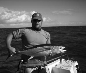 The author with a longtail tuna taken on a ballyhoo soft plastic.